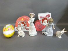 Three Nao figures in presentation tins and three boxed Nao child figures