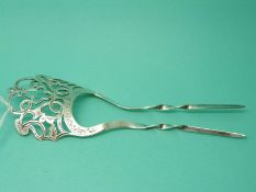 A hallmarked silver pierced hair comb,