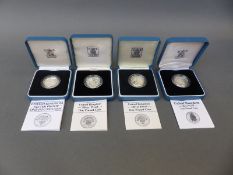 Four cased Royal Mint silver proof £1 coins, 1984, 1986,