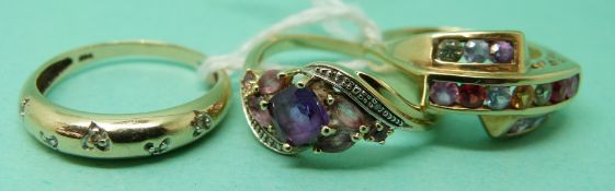 Three 9ct gold rings set with various gemstones