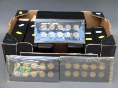 An amateur collection of English dodecagonal three penny pieces mounted on cards, 1941-1961,