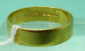 A 22ct gold wedding band, 3.