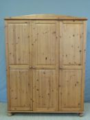 A three door pine wardrobe (W142 x D52 x H182cm)