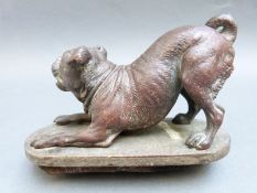 An Asprey bronze pug dog on base,