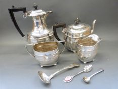 A silver plated tea set and a small quantity of plated cutlery