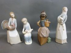 Four Lladro figurines with birds or animals