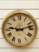 A Magneta brass cased wall clock with electric movement, diameter 37cm, Russells Ltd,