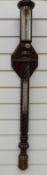 A Victorian stick barometer by Cail of Newcastle in wrythen carved case with brass mounts,
