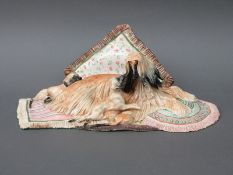 A large continental ceramic Afghan hound