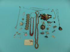 Two agate necklaces, coral necklace, silver filigree bracelet, filigree brooch, moonstone necklace,