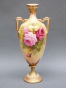 Royal Worcester twin-handled pedestal vase decorated with roses, signed A Shuck, shape H247,
