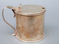 A Georgian hallmarked silver mustard with blue glass liner, Sheffield 1775, maker's mark rubbed,