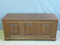 An oak linen fold carved blanket box (W141 x D56 x H63cm)