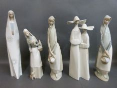 Five Lladro figurines including ladies carrying baskets,