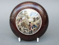 Prattware pot lid depicting a bear hunt, 7.5cm in diameter, in turned wooden frame.
