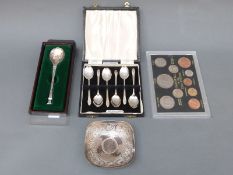 A cased set of six hallmarked silver teaspoons,