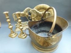 A pair of brass ejector candlesticks, coal scuttle,