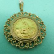 A 1981 1/10th Krugerrand in yellow metal mount