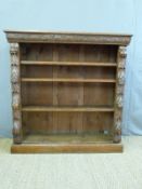 An oak carved bookcase with adjustable shelves (W107 x D30 x H109cm)