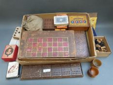 Vintage games including boxwood chess and draughts, playing cards,