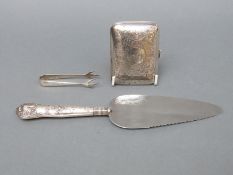 A hallmarked silver cigarette case and sugar nips, weight 67g,