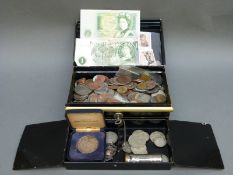 A collection of coins including pre 1947 silver, two,
