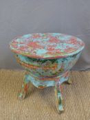 An unusual rustic painted drum shaped table, diameter 48cm.