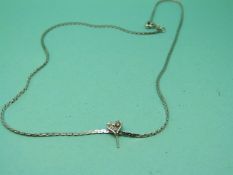 A 9ct white gold necklace (4.