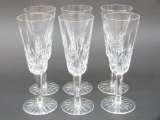 A set of six Waterford Crystal cut glass champagne flutes, 18.