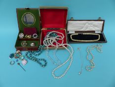 A small collection of costume jewellery, silver brooch, Victorian stick pin, bone necklace,