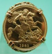A 9ct gold ring set with a 1981 gold full sovereign,
