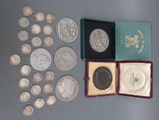 A collection of silver coins together with a miniature Rifle Club 'Bell Medal' award in Mappin &