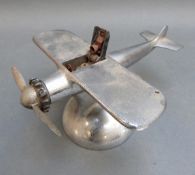 A vintage Demley aircraft chrome table lighter,