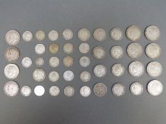 A quantity of pre-1920 silver including gradeable examples (60g) together with 179g of pre-1947