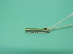 A 9ct gold pendant set with diamonds