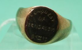 A yellow metal signet ring marked 9k engraved 