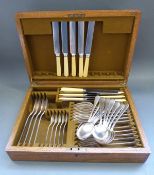 An oak cased Mappin & Webb six-place setting canteen of cutlery with some extra pieces