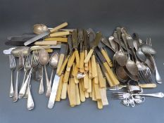 A quantity of silver plated cutlery including rat tail and fiddle pattern knives etc and a