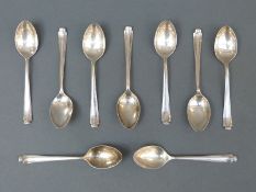 A set of nine hallmarked silver teaspoons, Sheffield 1931, 1937 and 1938, maker Atkin brothers,