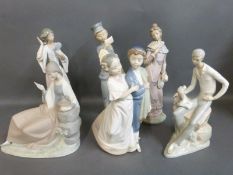 Nao figures including postboy, boy with puppy, girl with fan,