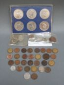 A catchet of UK and overseas coinage to include 1888 Victorian shilling, silver threepences,