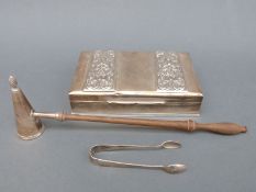 A Thai white metal cigarette box with embossed decoration,