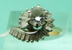 An 18ct gold ring set with a round brilliant cut diamond of approximately 0.