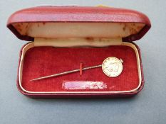 1851 USA gold Liberty dollar, mounted on pin.