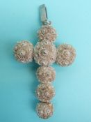 Two white metal cross pendants made up of spheres of filigree and two smaller pendants