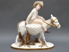Moore Brothers Victorian figural sweetmeat centrepiece in the form of a boy riding a donkey,