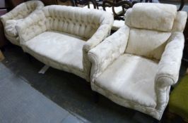 A Chesterfield sofa and two matching chairs,