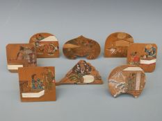A set of eight Japanese hand decorated wooden place names,