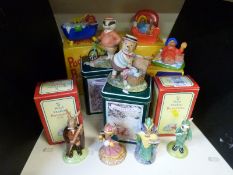 A group of seven boxed ceramic figures to include two Bunnykins,