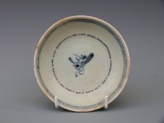 A Chinese blue and white dish from the Tek Sing cargo wreck of 1822,
